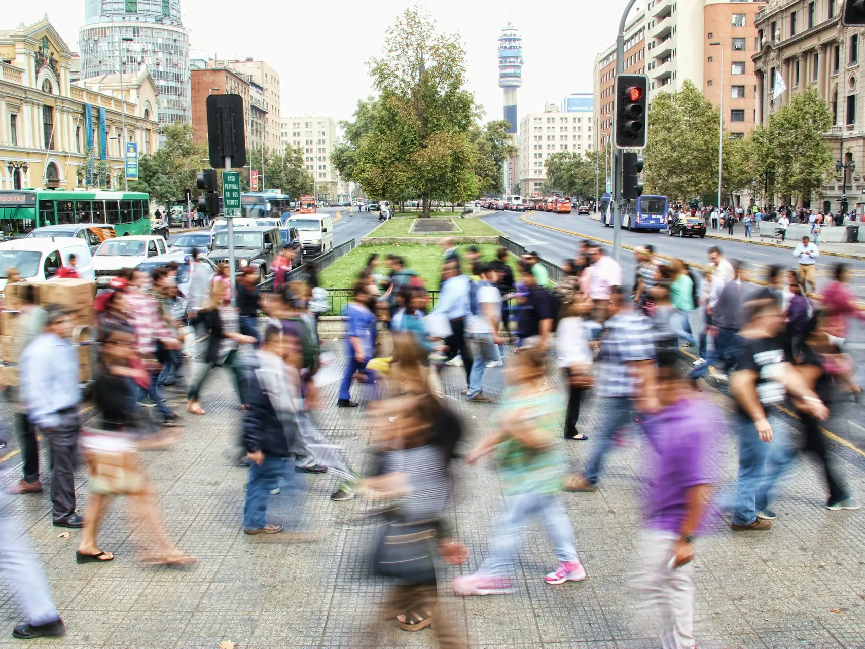 timelapse photo of people passing the street
